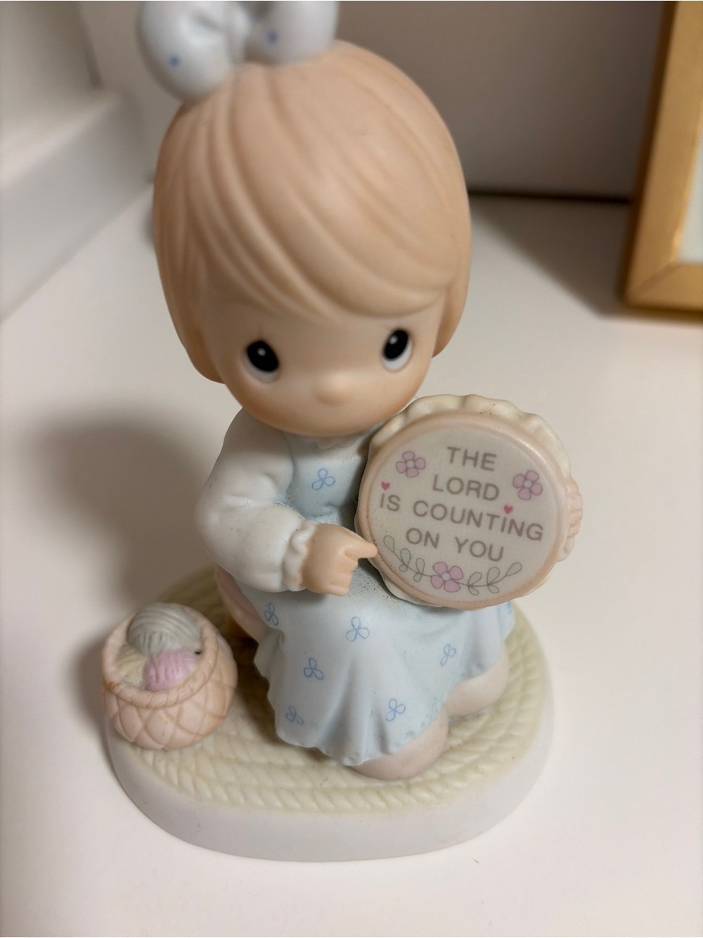 Precious Moments figurine titled "The Lord Is Counting On You" 1993
